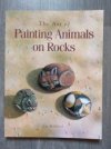The Art of Painting Animals on Rocks